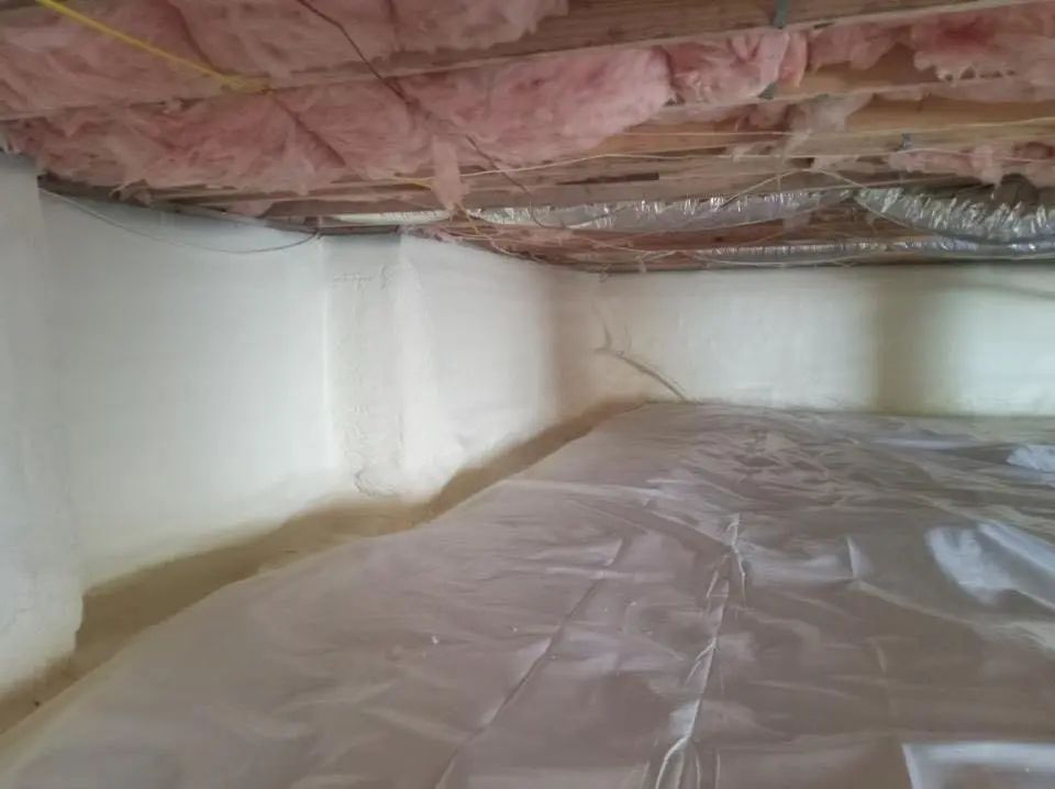 Crawl space encapsulation with closed-cell spray foam for Commercial Roof Restoration in Asheville
